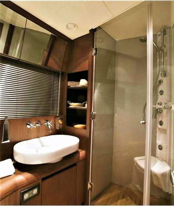 Twin cabin's en suite bathroom, with Hydro-Jet shower and 2 doors, used also as Day Head
