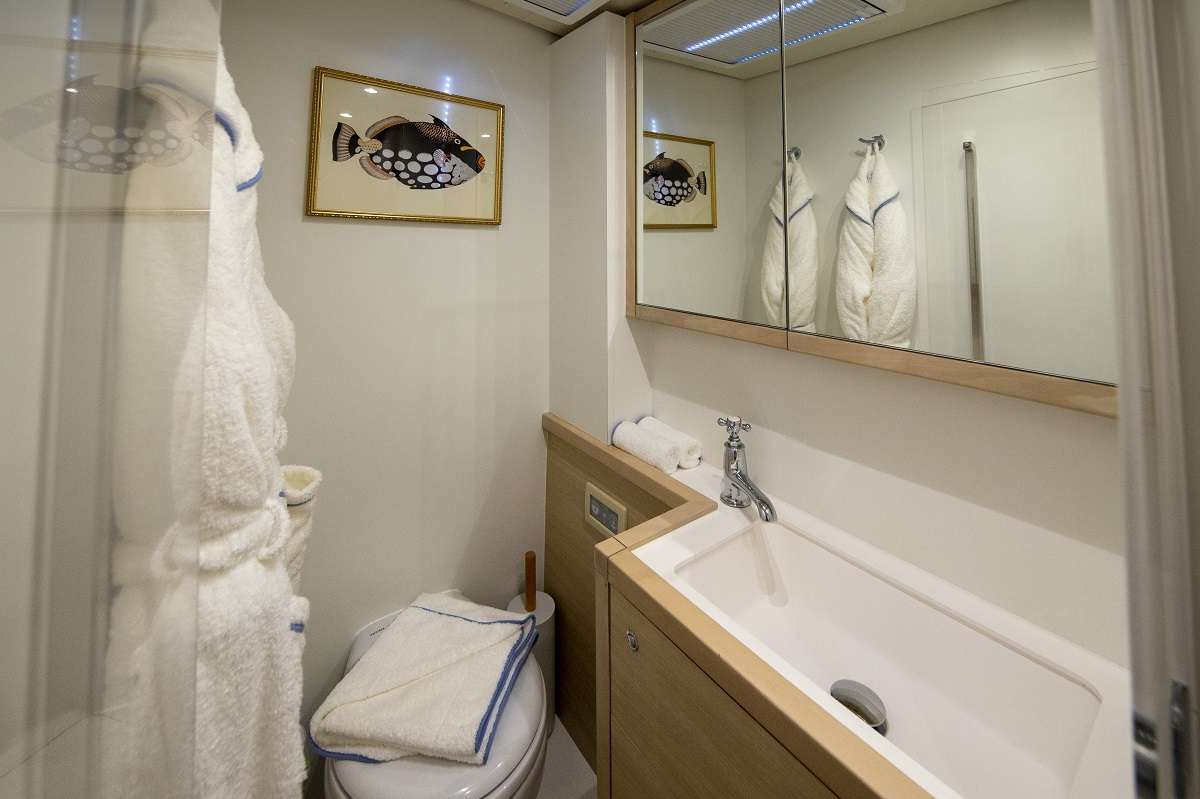 En suite bathrooms with standing shower, plush robes, and artisanal bath & body products created exclusively for NOMADA.