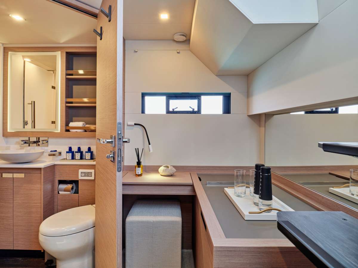 Guest cabin desk area and bathroom